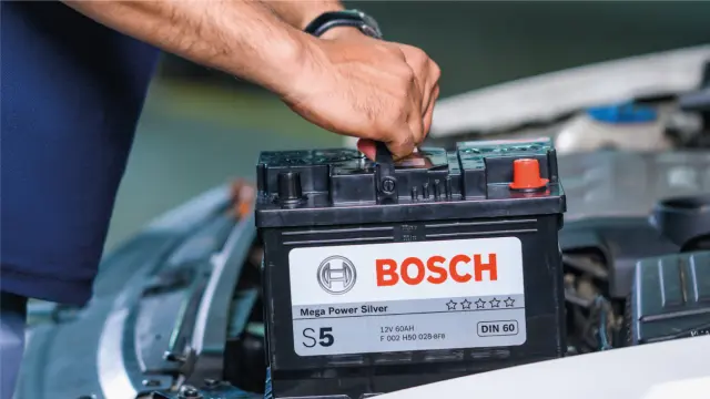 Bosch battery replacement service in Qatar by AAQATAR at roadside